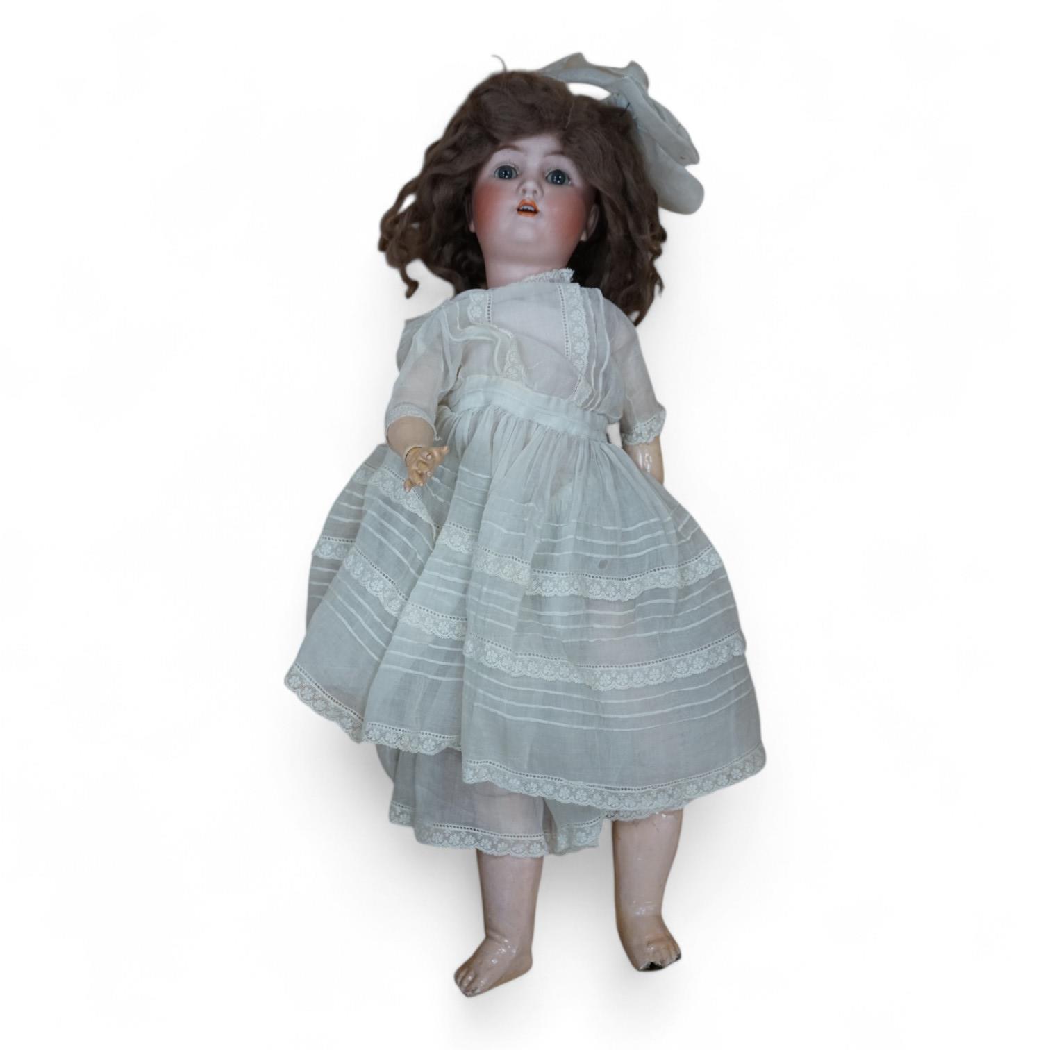 An Alt Beck and Gottschalk bisque doll. Condition - fair